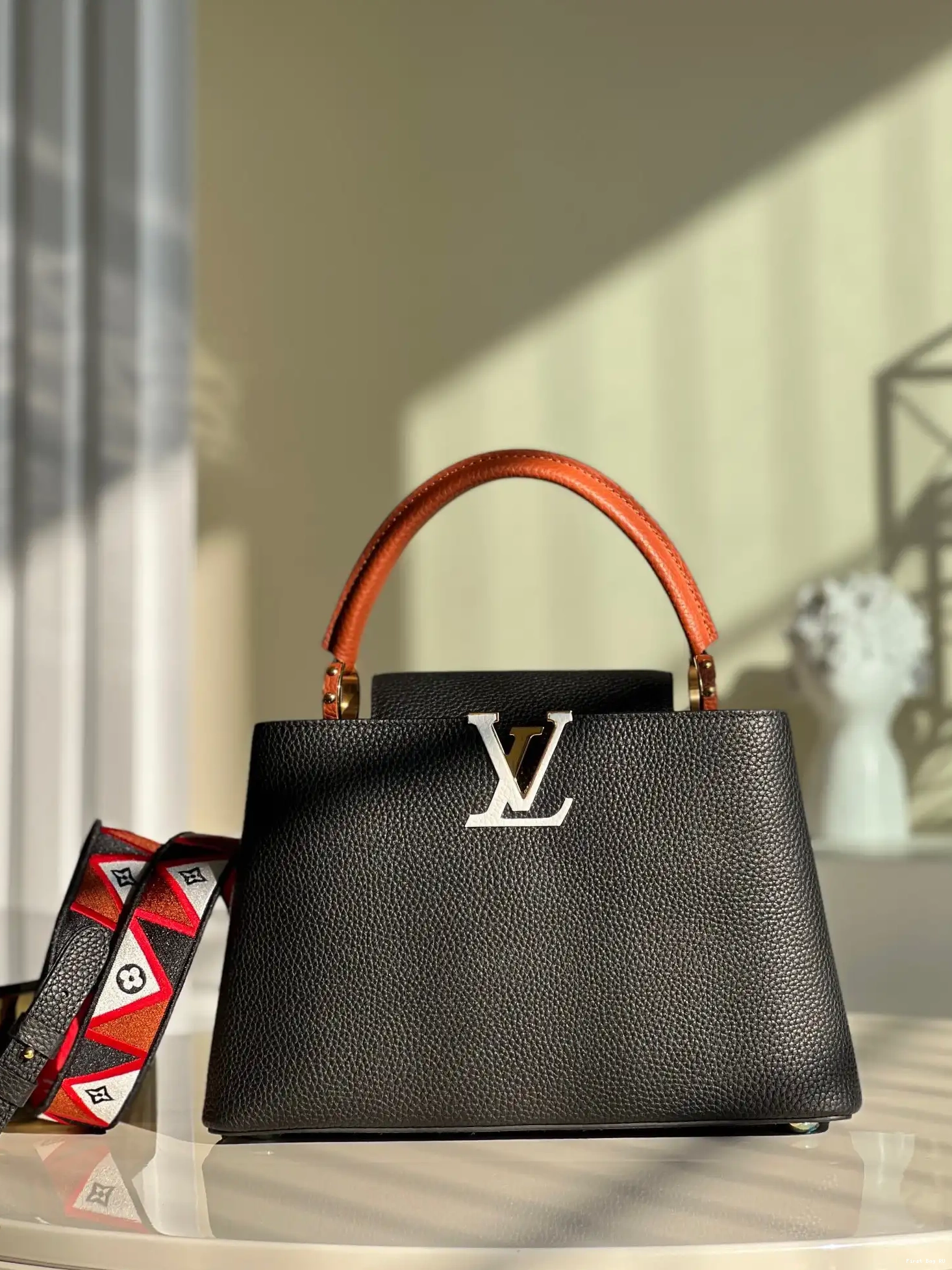 First bag MM LOUIS VUITTON CAPUCINES 0518